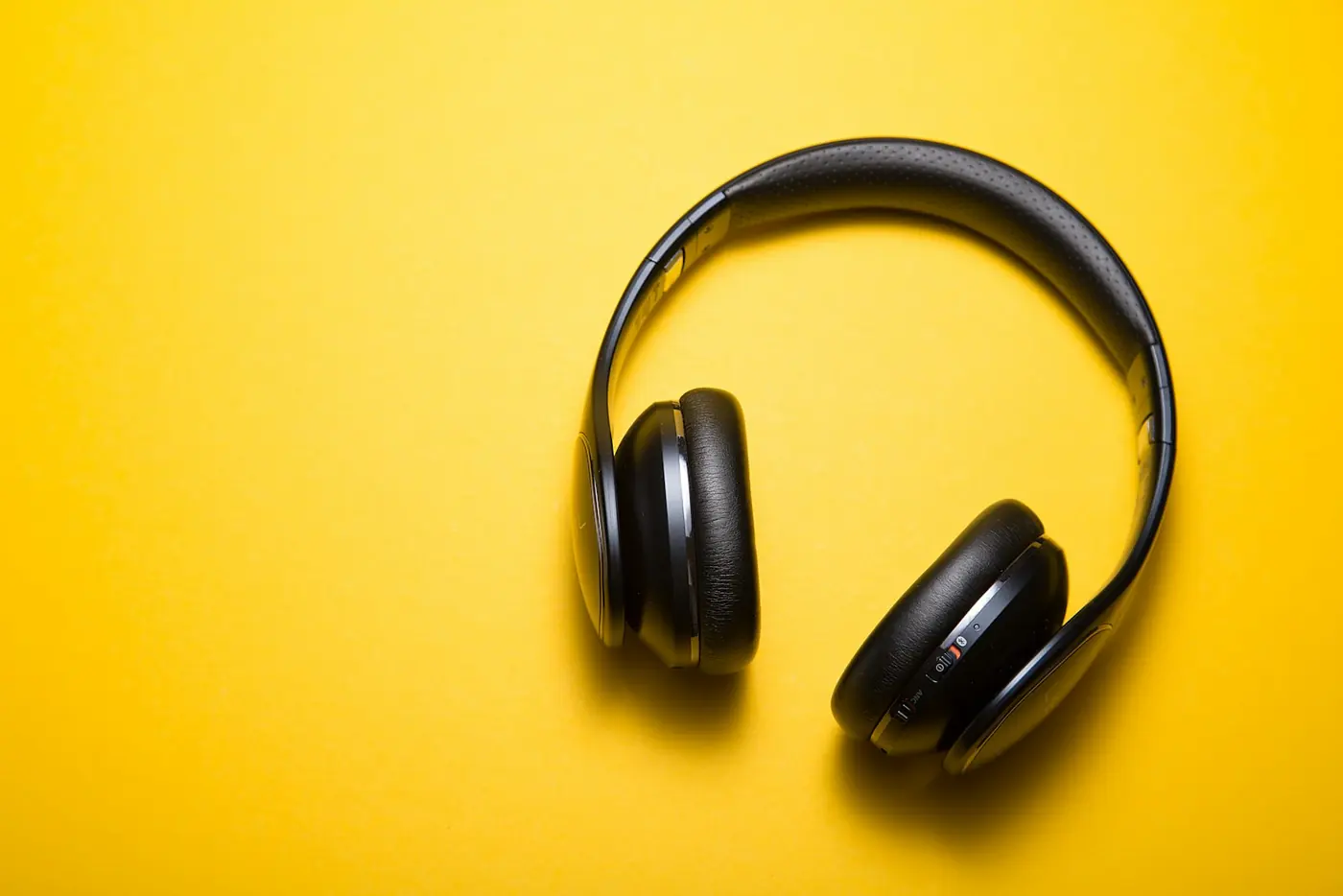 Headphones on a yellow background